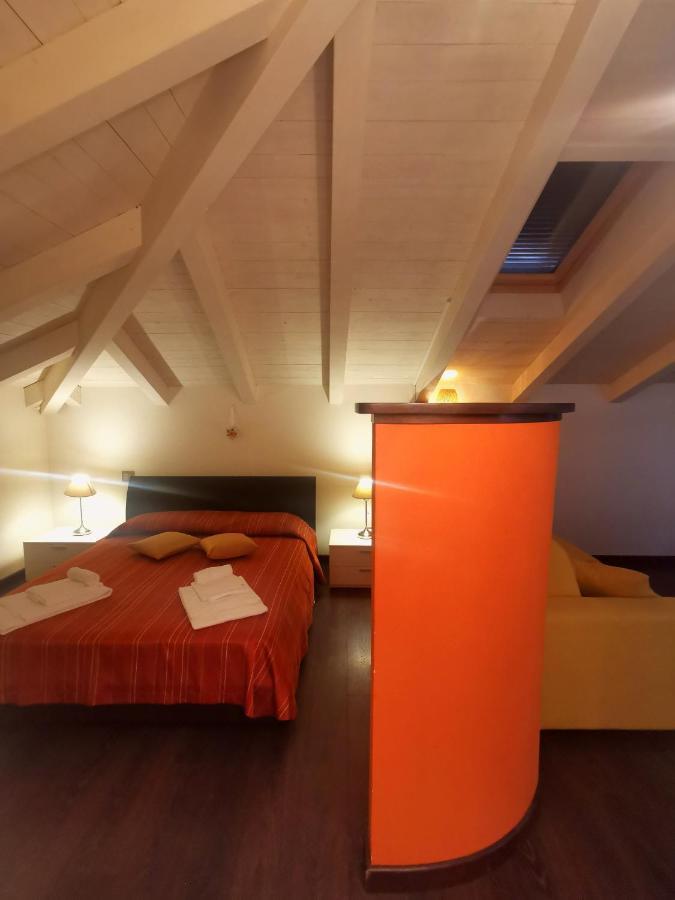 Arc En Ciel Appartments Cocconato Bagian luar foto